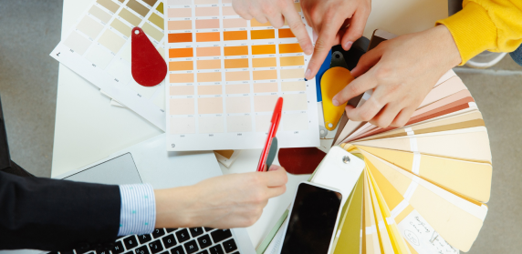 Designers comparing colour swatches for an interior scheme