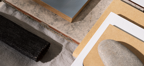 Close-up of furniture materials: fabric, timber and stone samples