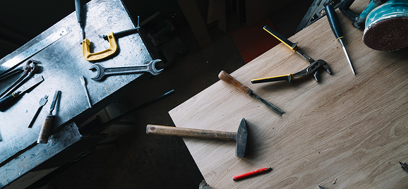 Tools on a workbench in a manufacturing workshop