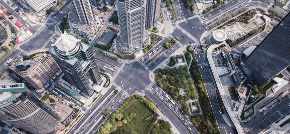 Aerial view of a city road junction and buildings