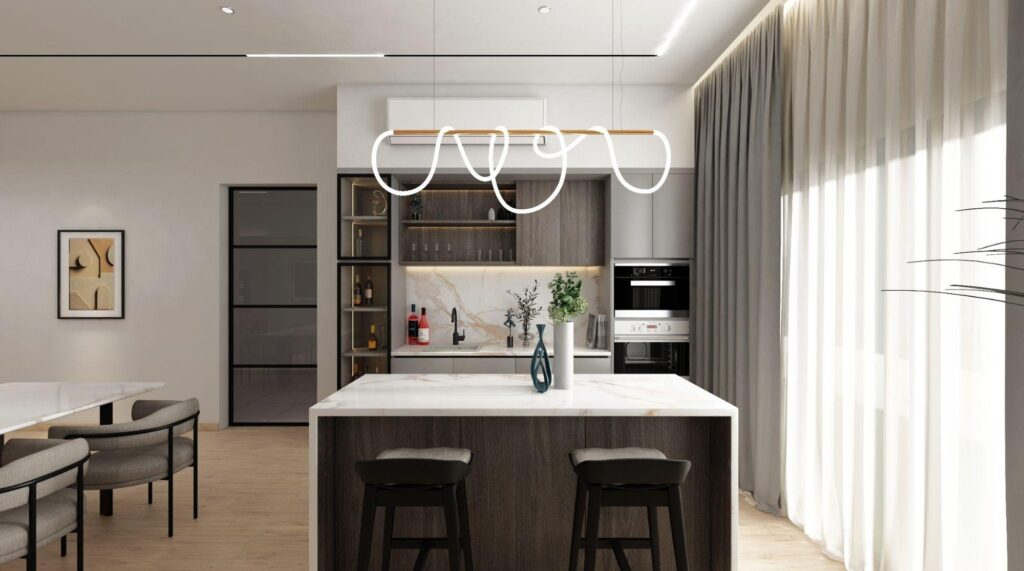 Dry kitchen island with dark timber base, marble top and built-in ovens, Elemen Residence Tropicana Aman